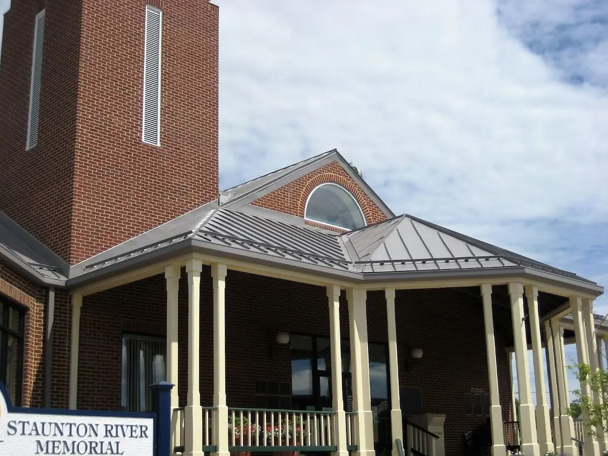 Skilled roofing craftsmen working on a residential roof in Orangeburg